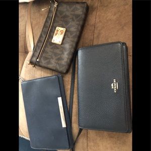 2 Michael kors and 1 coach